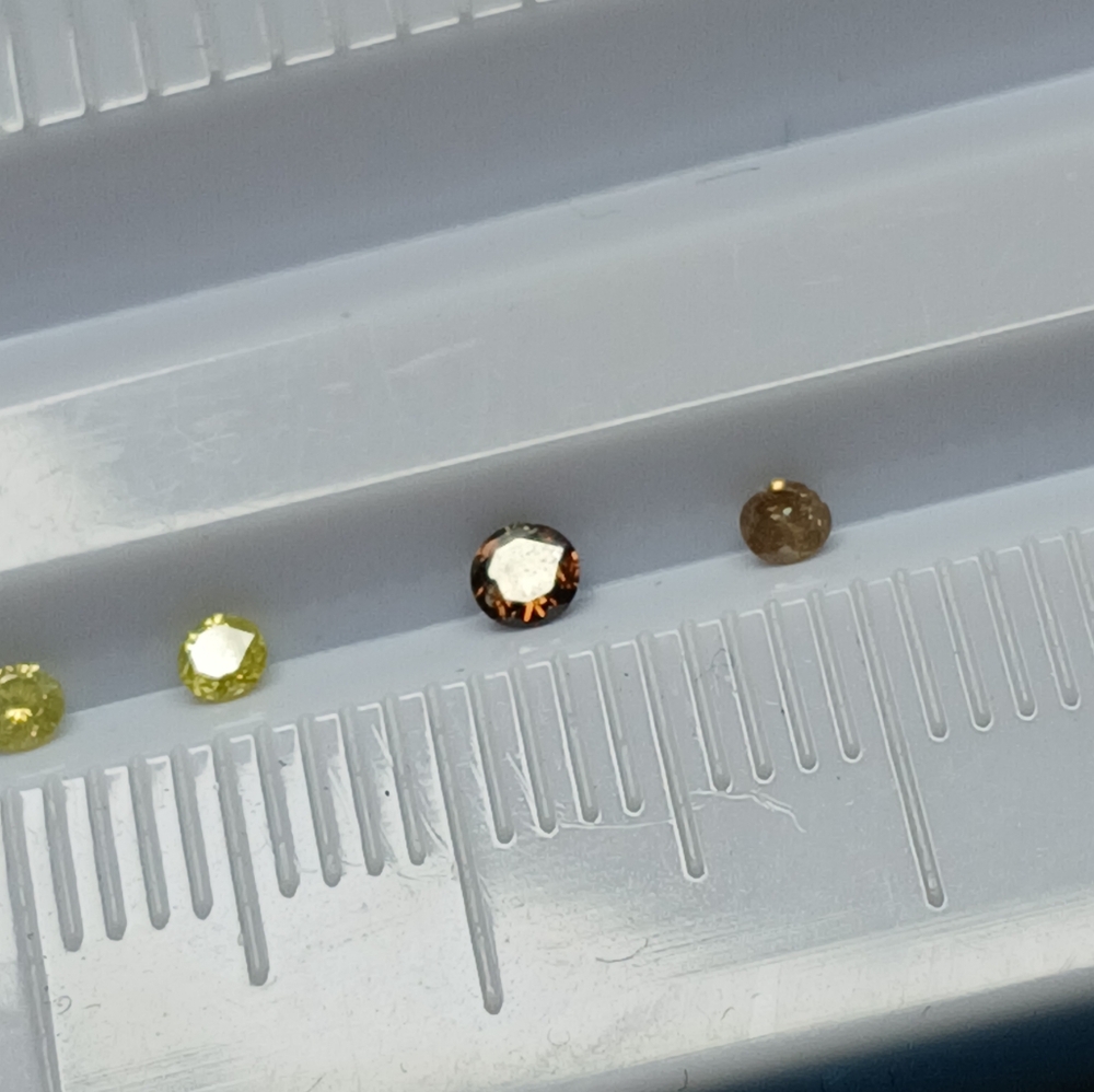 Lot of White, Yellow, and Champaigne Diamonds